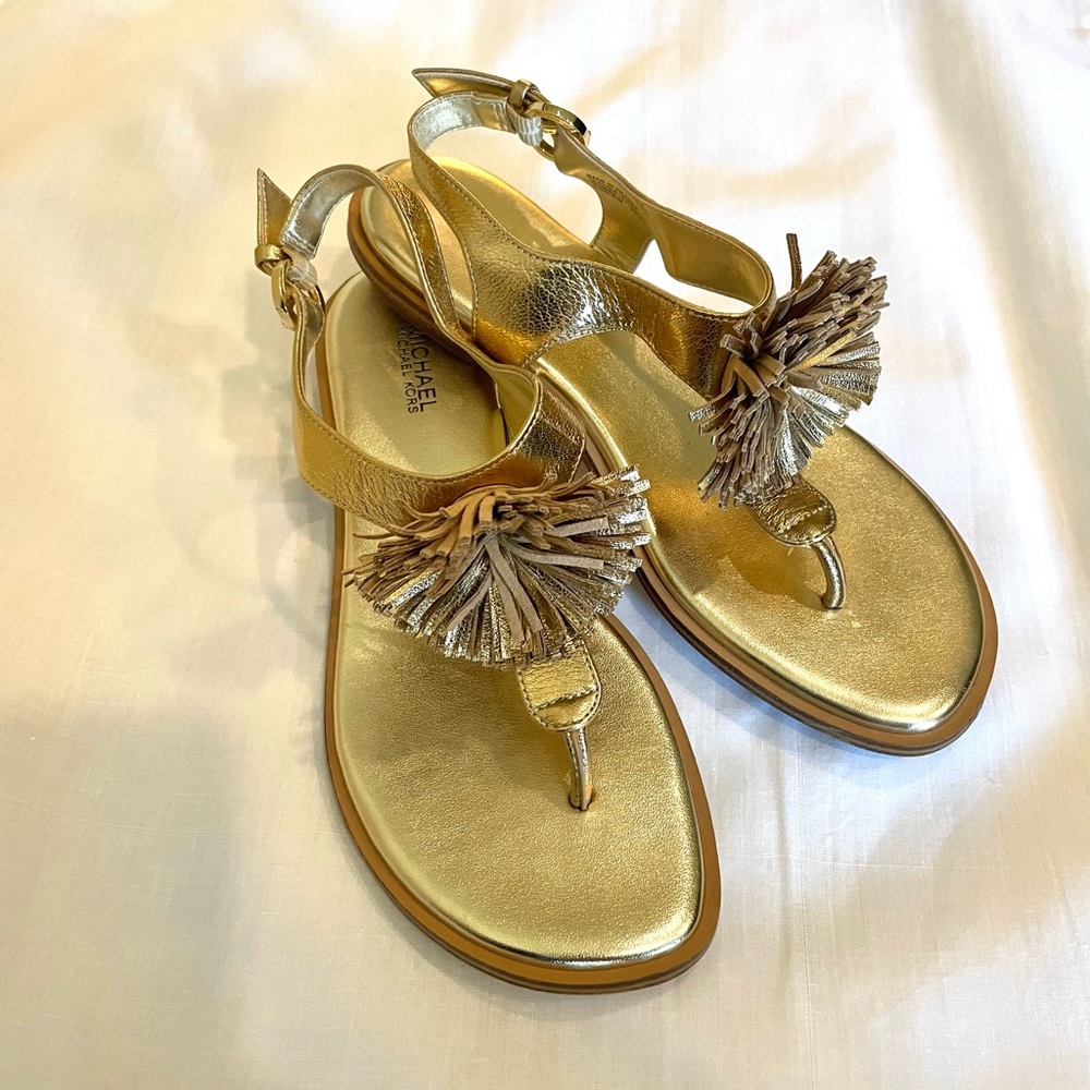 Michael Kors  terrific “Lolita” gold leather pom pom sandal size 6.5